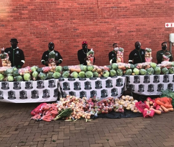 Packing-of-vegetable-hampers-for-distribution-at-Itsoseng-Inform1
