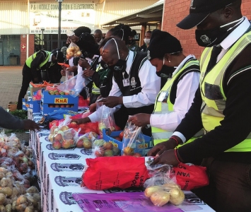 Packing-of-vegetable-hampers-for-distribution-at-Itsoseng-Inform2