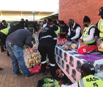 Packing-of-vegetable-hampers-for-distribution-at-Itsoseng-Inform4